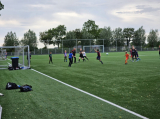 Laatste training S.K.N.W.K. JO11-1JM (partijtje tegen de ouders) van maandag 27 mei 2024 (4/137)